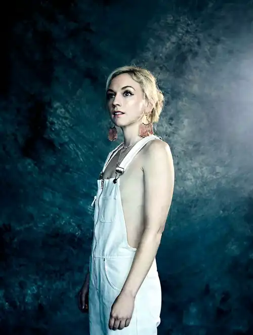 Emily in (only) overalls