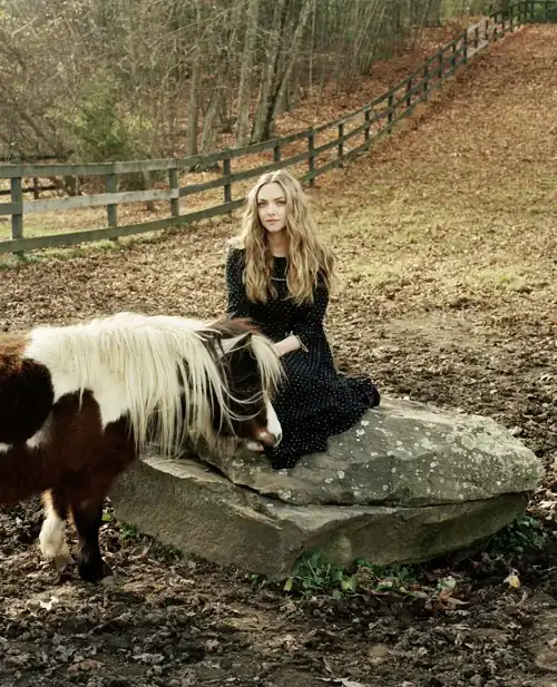 Amanda with a pony on her farm
