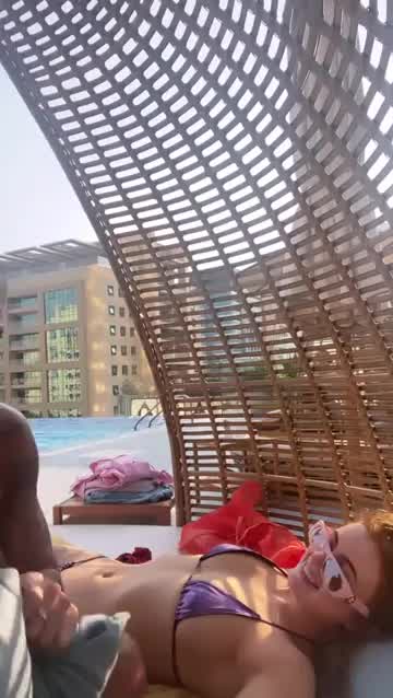 Maisie Smith's lie-down in a bikini rudely interrupted