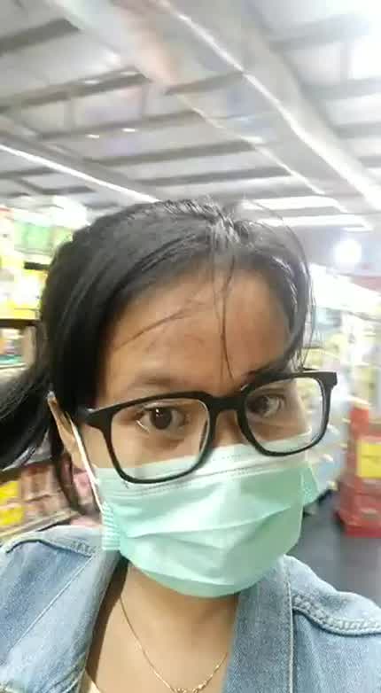 Flashing her big tits in the grocery store