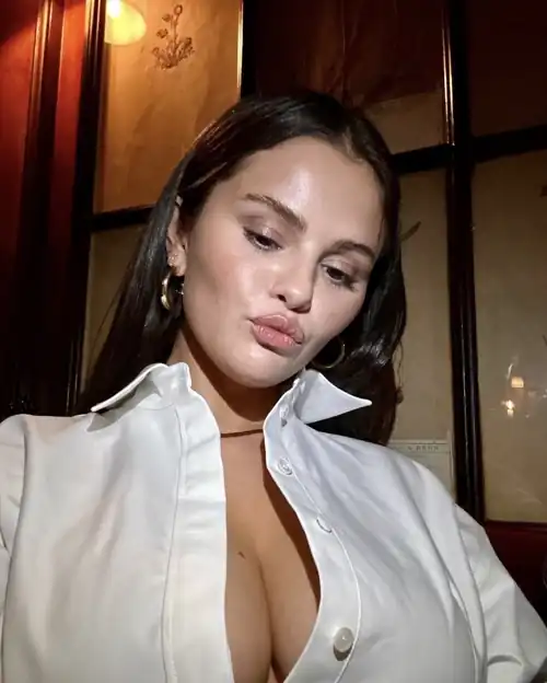 Checking out her bust