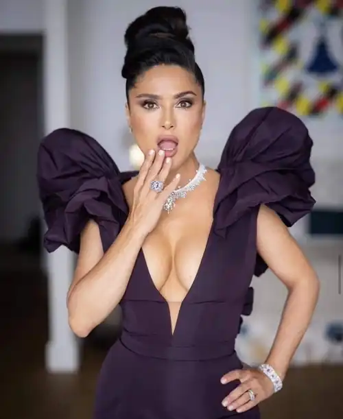 Wiping her lips – what's got her flustered?