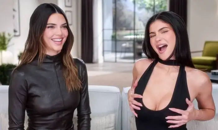 Kylie Jenner holding her tits