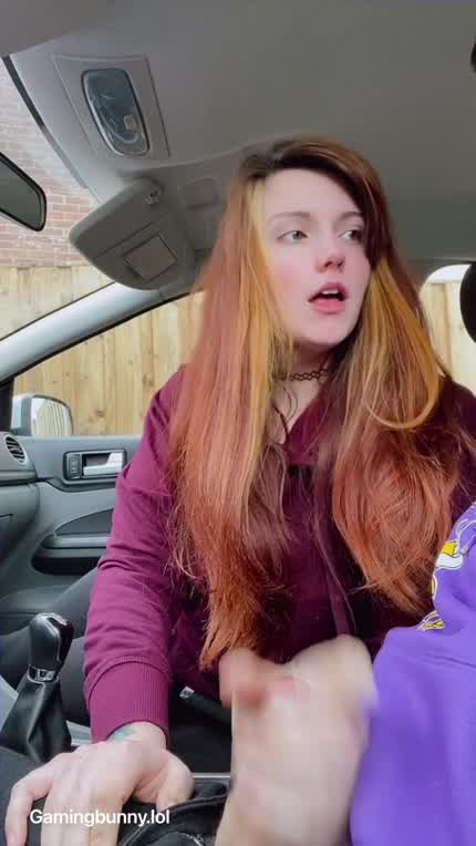 Red head gives a quick little tug in the car