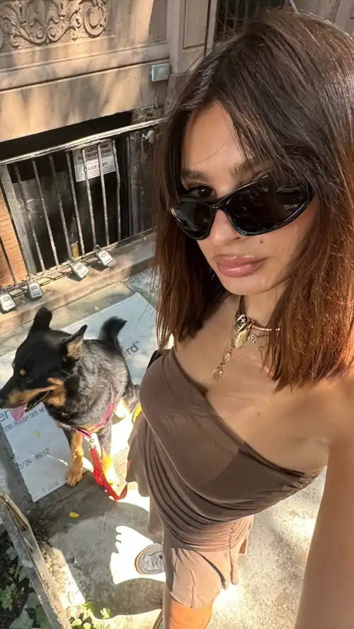 Walking her dog IG 7/15/2024