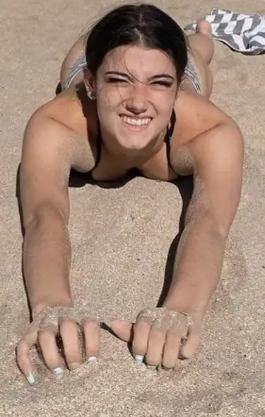 My view of my gf Charli as she has some nice beach fun with the lifeguard: