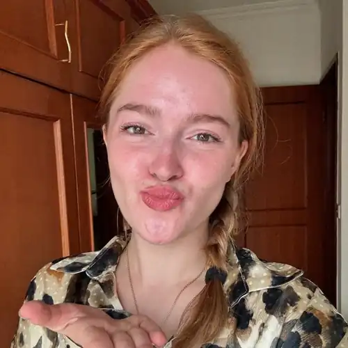 Blowing a kiss
