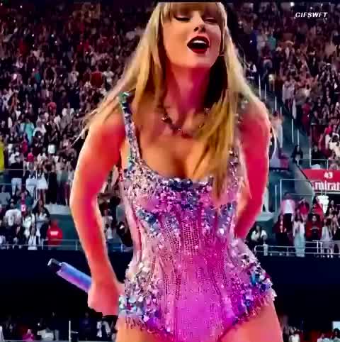 Flaunting her cleavage