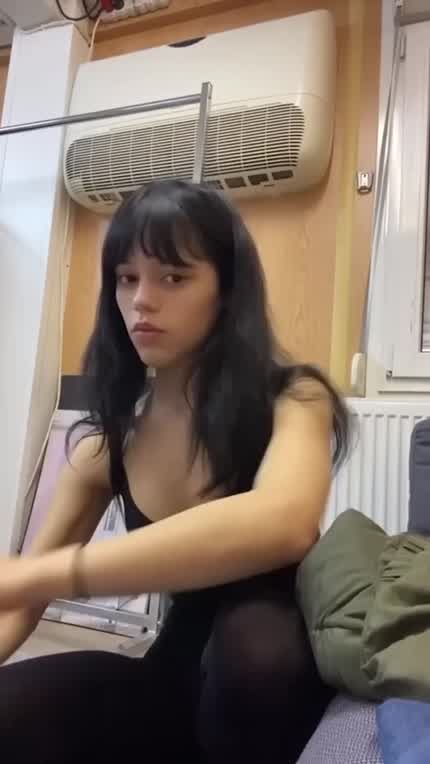 Wearing her prom dress