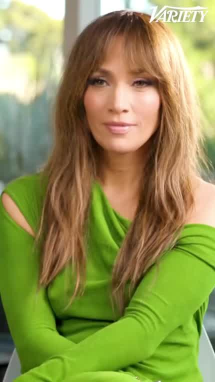 JLo wearing green in an interview 