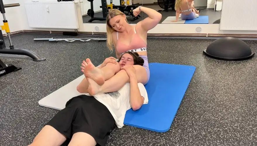 The strong woman in headscissors is a sight to behold - a force to be reckoned