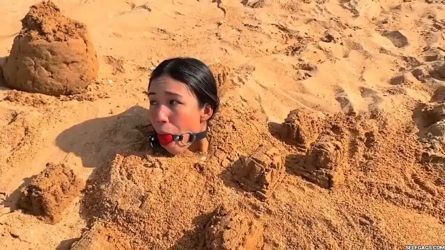 Does being buried in sand count as Outdoor Bondage?