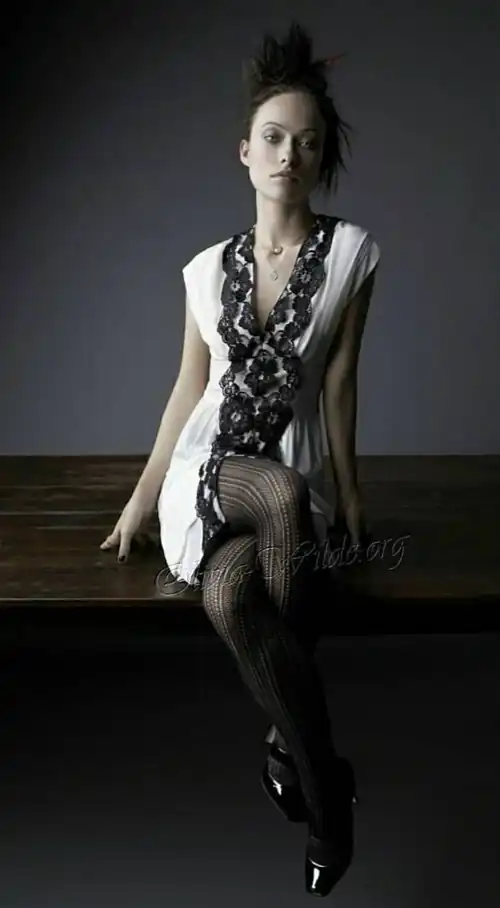 Olivia Wilde double Crossed legs