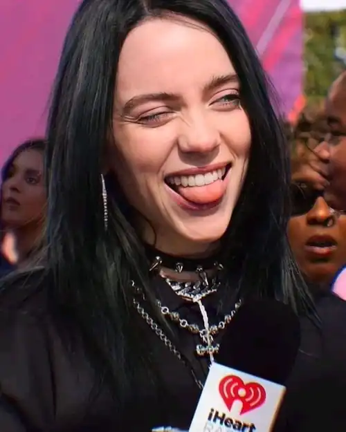 Biting that tongue 👅