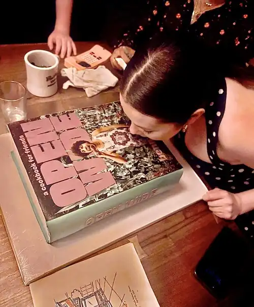 Selena licking Benny’s icing.