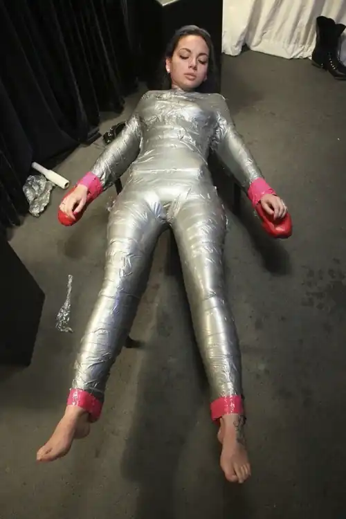 Now she is one with the bondage table