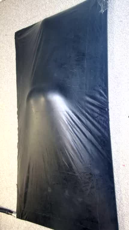 Being sealed face down in a latex vacbed
