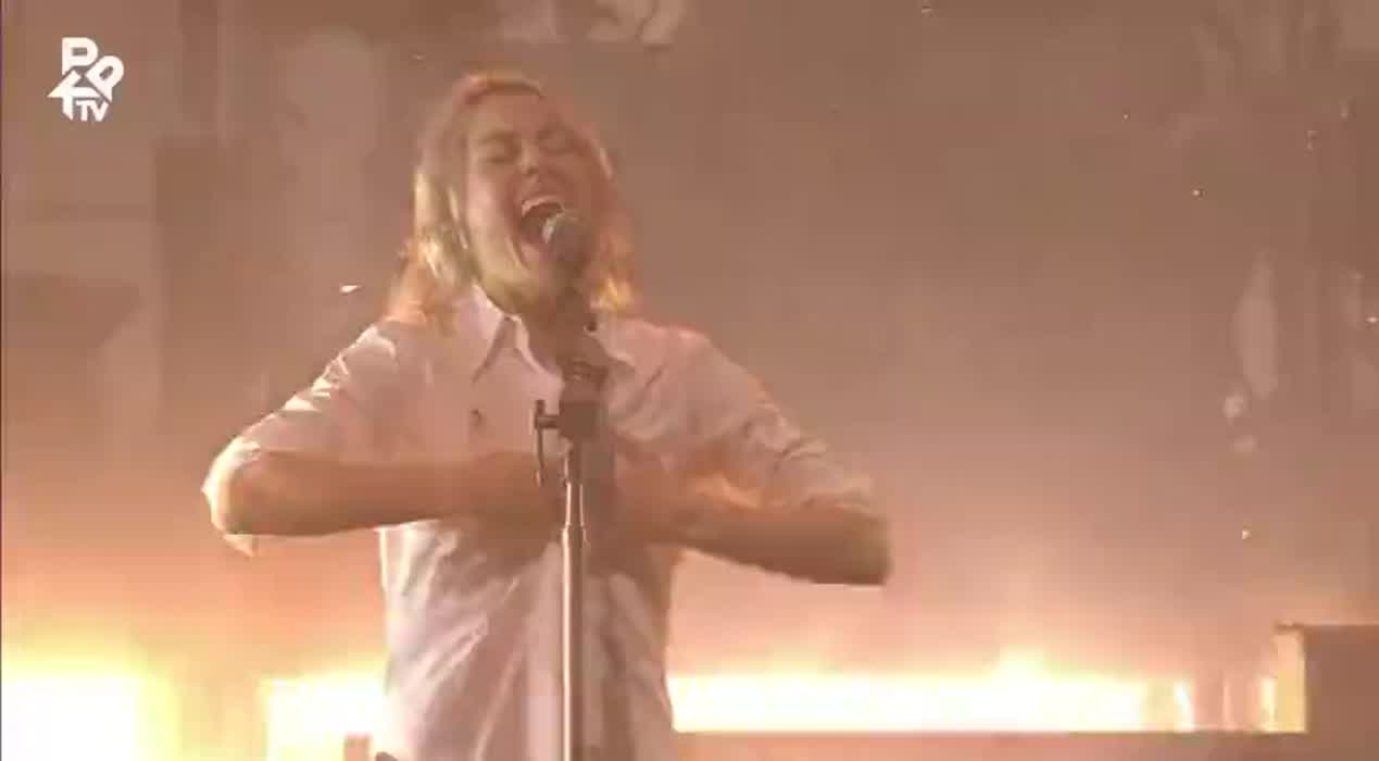 Phoebe Bridgers at flashing on stage at Pukkelpop