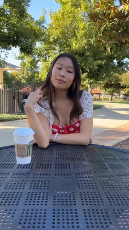 Showing her innocent pussy at the park