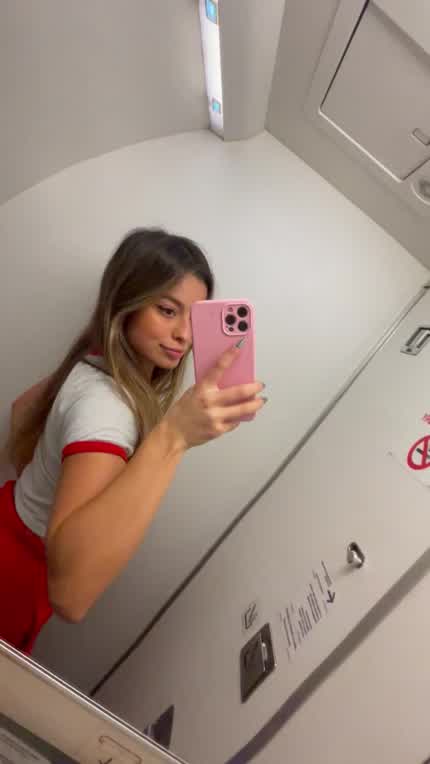 I'm so horny that I had to go to the airplane bathroom to touch myself